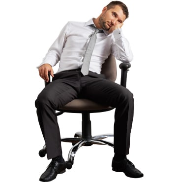Lillie Chiropractic - Offering - Get The Most Out of You - Assets - man_tired_sitting_in_a_desktop_chair